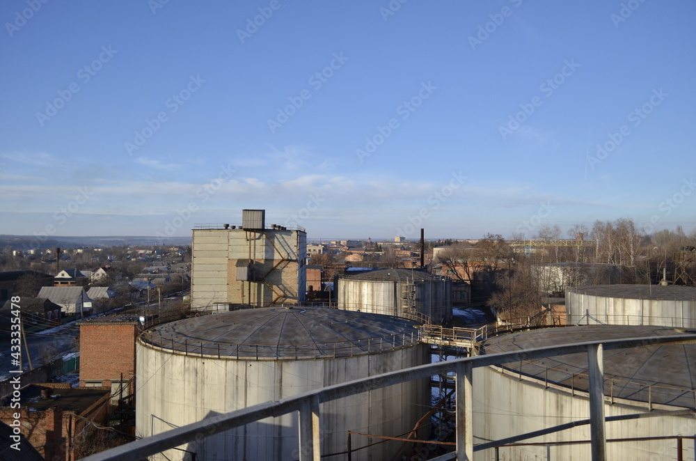 Top view of oil storage tanks on  a plant