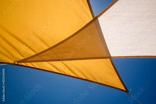 blue sky and textile awning for the sun