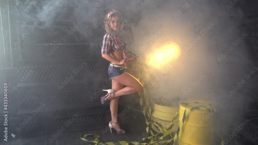 Slow Motion Attractive steam grunge girl. Girl in a country fashion style