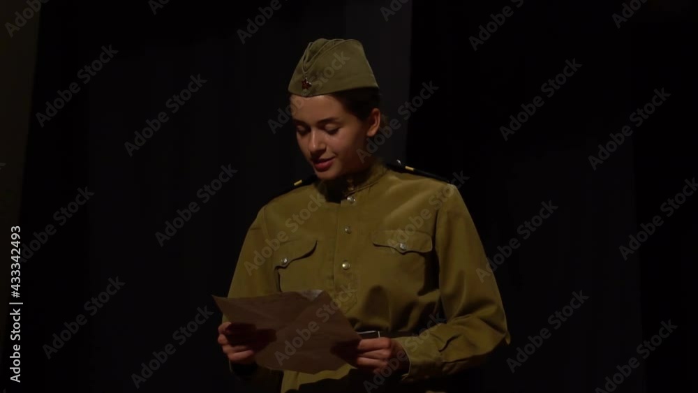 Actress in military uniforms of the Soviet army of World War II play Actress in military uniforms of the Soviet army of World War II play