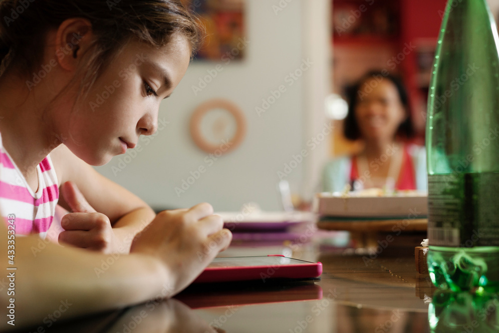 Girl using digital tablet Girl using digital tablet