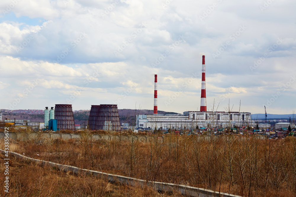 Industrial zone. Thermal power plant. Heating of the city. Environmental pollution, an environmental problem.