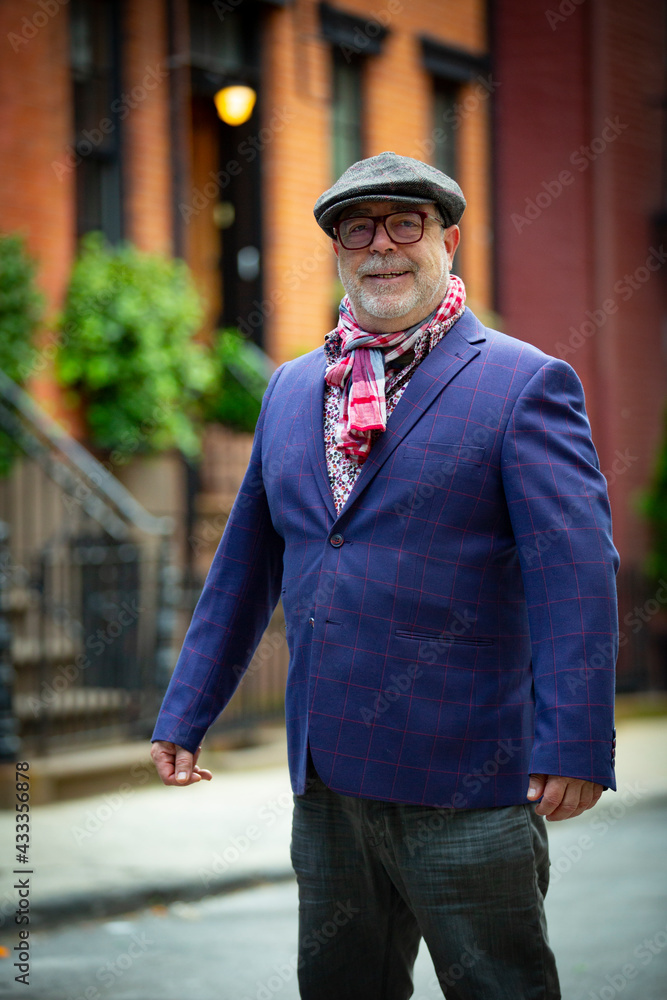bohemian artist man in colorful clothes walking in the west village in New York bohemian artist man in colorful clothes walking in the west village in New York