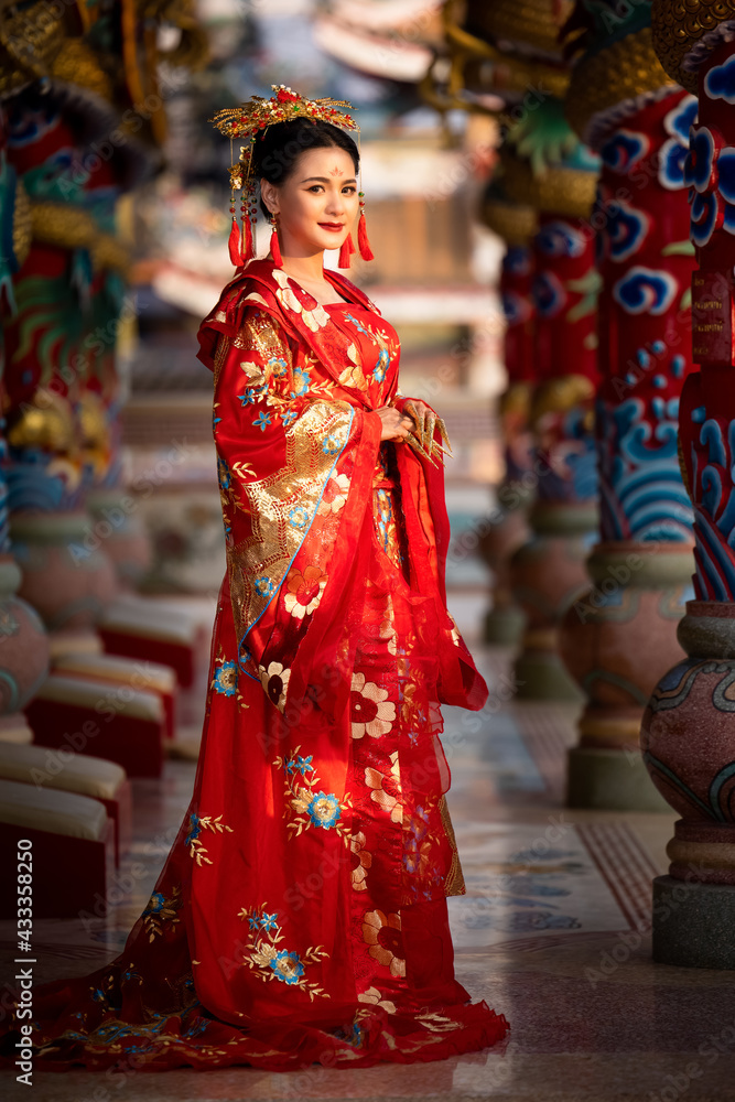 Asian woman in chinese dress traditional at Temple