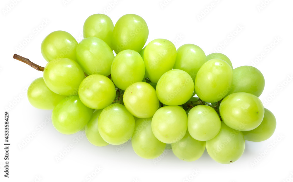Japanese Shine Muscat Grape with leaves isolated on white background,Sweet Green grape isolated on white With clipping path. Japanese Shine Muscat Grape with leaves isolated on white background,Sweet Green grape isolated on white With clipping path.