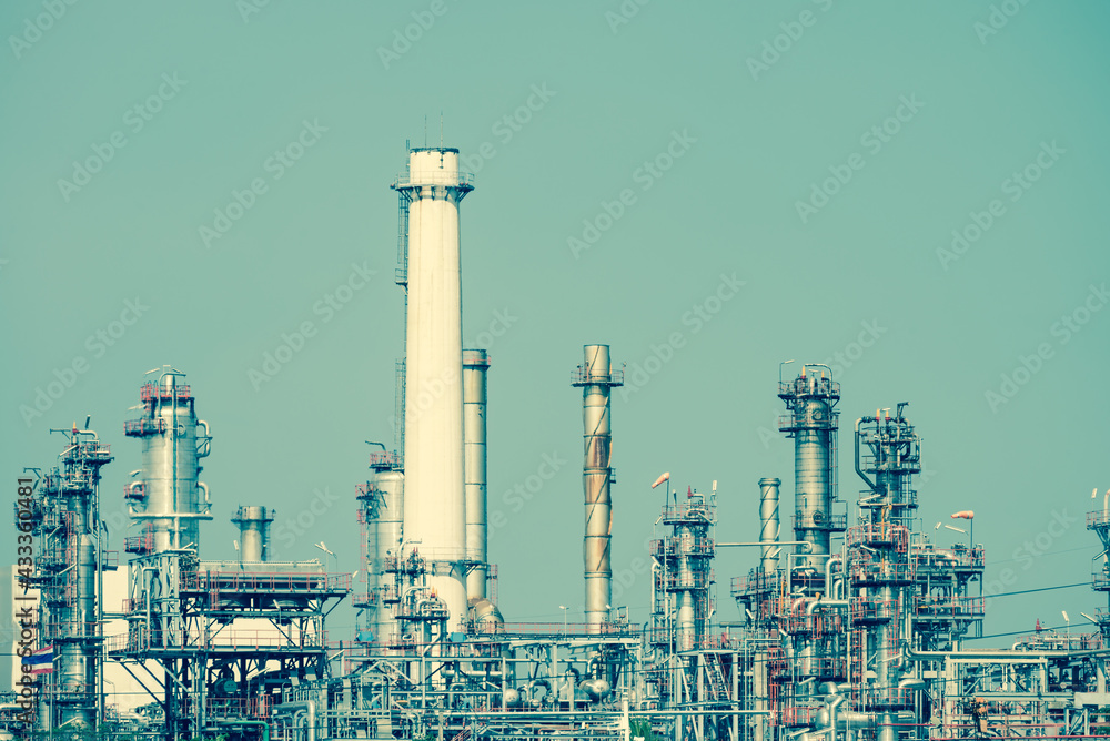 Oil refinery plant factory in industry economic zone. Petrochemical, petroleum, power energy and engineering concept Oil refinery plant factory in industry economic zone. Petrochemical, petroleum, power energy and engineering concept