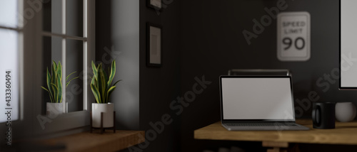 3D rendering, laptop with mock-up screen on office desk and decorations in loft room, home office interior