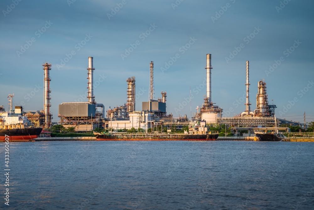 Oil refinery plant factory in industry economic zone. Petrochemical, petroleum, power energy and engineering concept