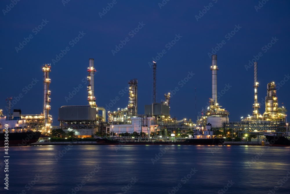 Oil refinery plant factory in industry economic zone. Petrochemical, petroleum, power energy and engineering concept Oil refinery plant factory in industry economic zone. Petrochemical, petroleum, power energy and engineering concept