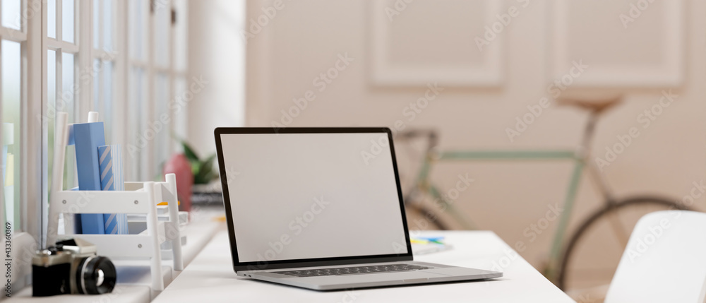 Laptop with mock-up screen on working desk in home office room, 3D illustration Laptop with mock-up screen on working desk in home office room, 3D illustration