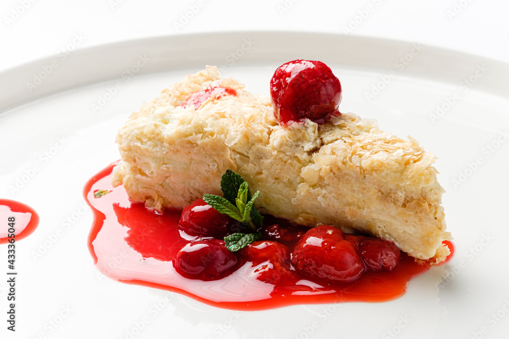 napoleon cake with cherry sauce and mint