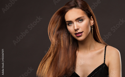 Hair Model Beauty. Brunette Woman with Long Shiny Straight Wavy Hairstyle. Beautiful Girl with Dyed  Coloring Shatush Hair. Fashion Cosmetics Make up Face