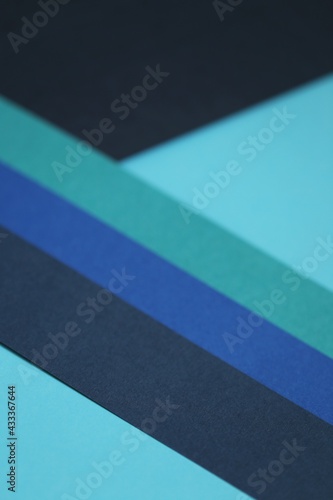Geometric pattern.minimalist design. Abstract geometric diagonal background in blue cold tone. Paper texture