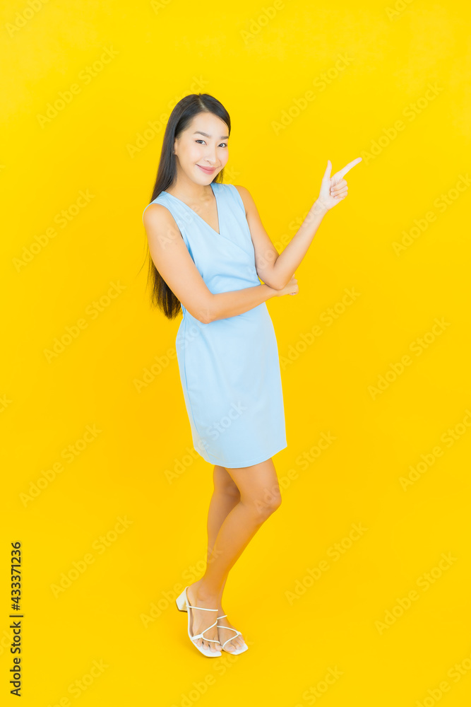 Portrait beautiful young asian woman smile with action Portrait beautiful young asian woman smile with action