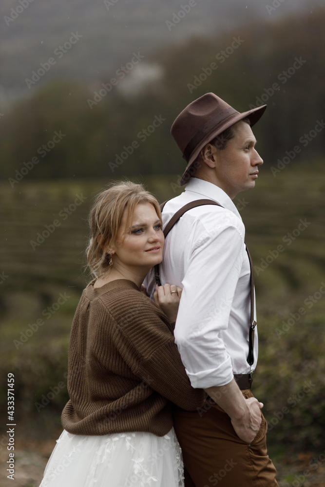 The couple enjoys the view of nature among the tea plantations. A farm-style wedding on a mountain tea plantation. The couple enjoys the view of nature among the tea plantations. A farm-style wedding on a mountain tea plantation.