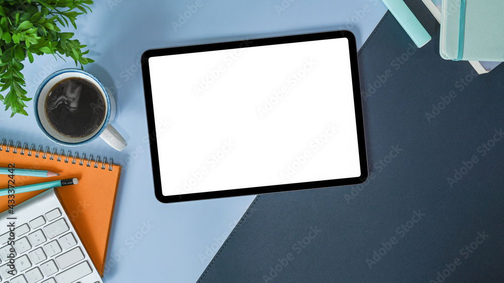 Digital tablet with with blank screen on stylish workspace. Digital tablet with with blank screen on stylish workspace.