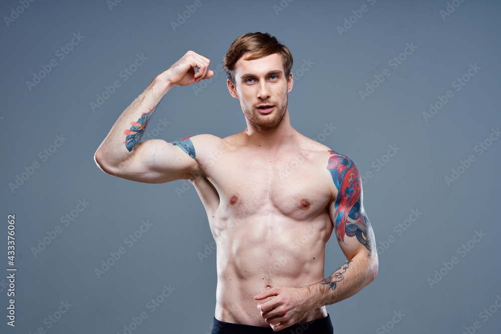 athletic male topless arm muscles muscular bodybuilder fitness