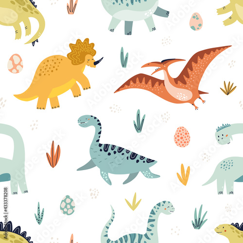 Cute dino seamless pattern. HAnd drawn vector illustration for nursery design.