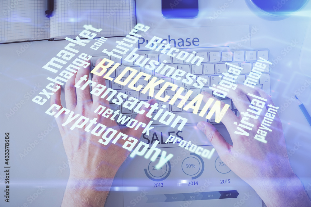 Double exposure of man's hands typing over computer keyboard and crypto currency theme hologram drawing. Top view. Blockchain concept. Double exposure of man's hands typing over computer keyboard and crypto currency theme hologram drawing. Top view. Blockchain concept.