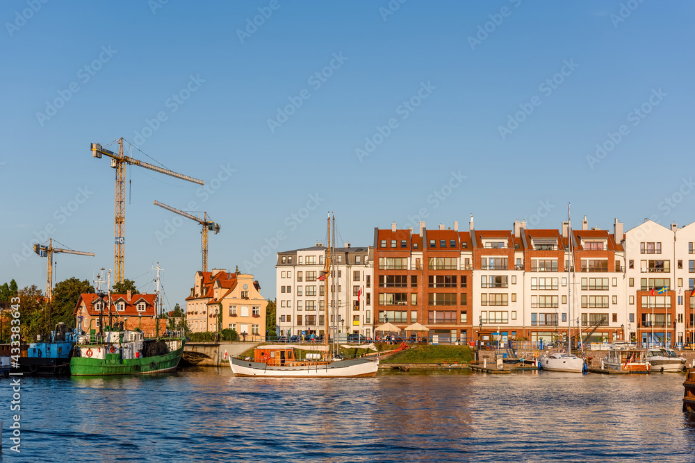 new residential buildings build in a harbour in an urban environment