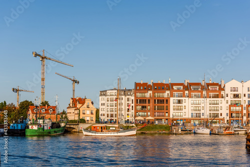 new residential buildings build in a harbour in an urban environment © lenaivanova2311