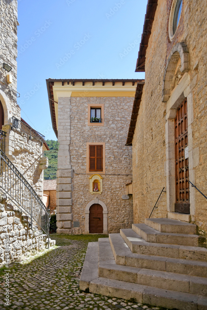 Sonnino, Italy, 05/10 / 2021. A street between old medieval stone buildings of a historic town in Lazio region, Italy.