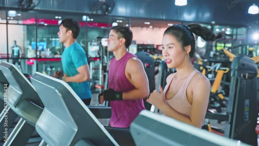 Group of multiethnic athlete doing exercise by running on treadmill. Group of multiethnic athlete doing exercise by running on treadmill.
