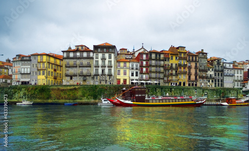 Colorful buildings in old town skyline on the beautiful Douro River in Porto, Portugal. 