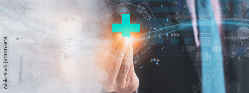 Obraz na plátně Blurred-businessman hand holding modern medical sign interface,with medical netw