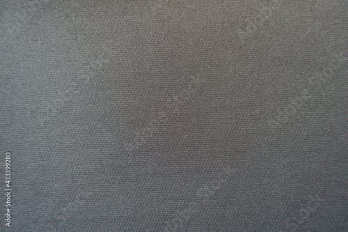Background - simple dark gray viscose and polyester fabric from above