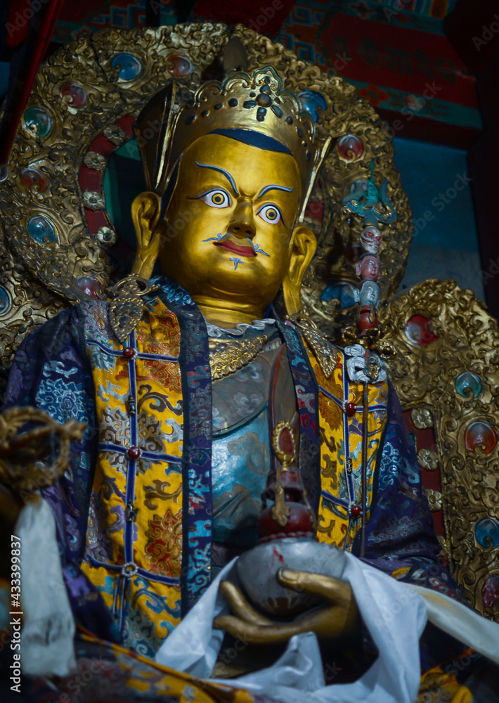 golden buddha statue at a monastery in Sikkim, India