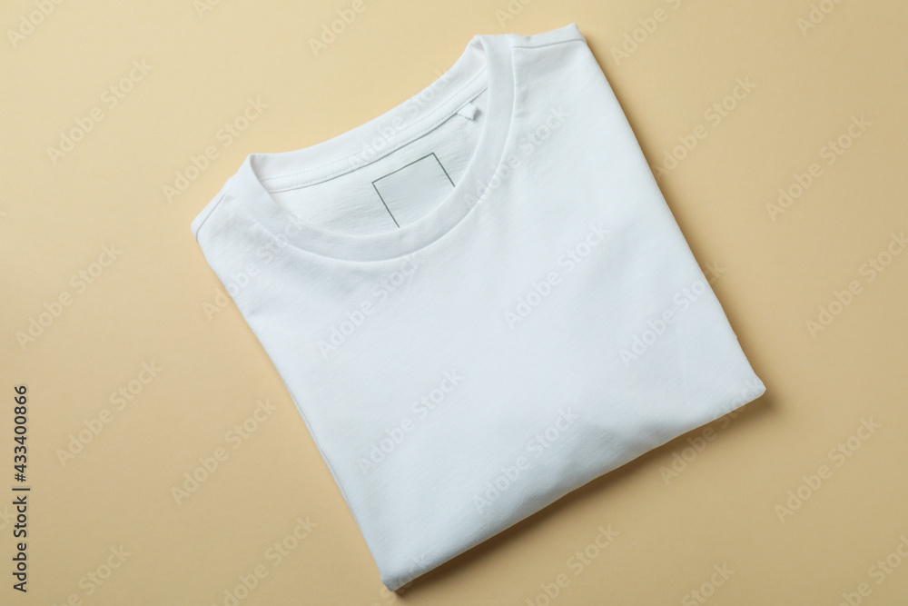 Blank sweatshirt on beige background, space for text Blank sweatshirt on beige background, space for text
