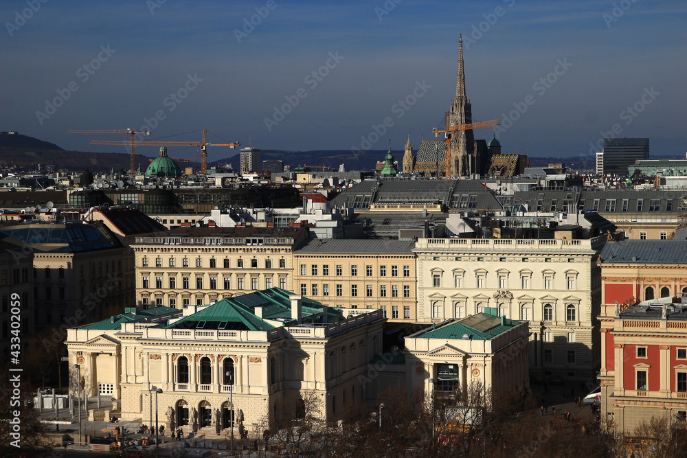 Panoramic view of Vienna (Austria) with St. Stephen's Cathedral, St. Peter's Church, Musikverein and Kunstlerhaus seen from the top of St. Charles Borromeo Church.