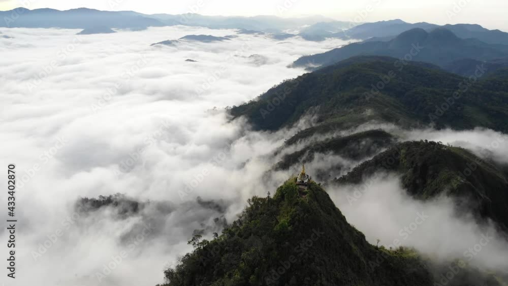 Aerial shot video 4k. beautiful stupa on the landmark mountain thailand. beautiful Sea of fog Aerial shot video 4k. beautiful stupa on the landmark mountain thailand. beautiful Sea of fog