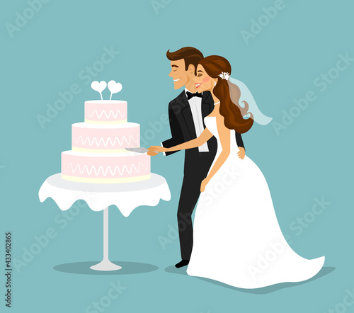 Newly married couple cutting wedding cake