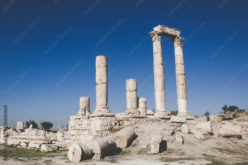 The ruin of the roman structure of the Temple of Hercules in Amman, with a very beautiful clear sky without clouds