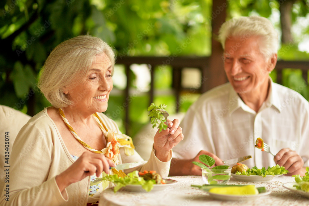 Happy Senior couple having diner Happy Senior couple having diner