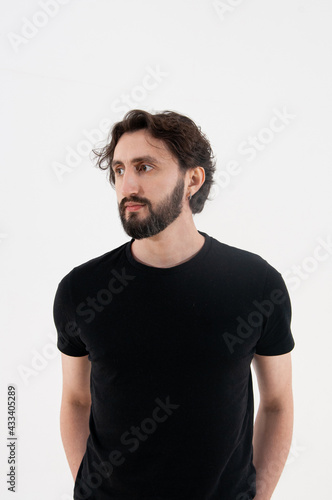 portrait of a person, beard, black t-shirt