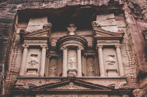 A close up of The treasury in Petra, the most famous carved out of the sandstone rock structure. It's name in Arabic is Al Khazneh