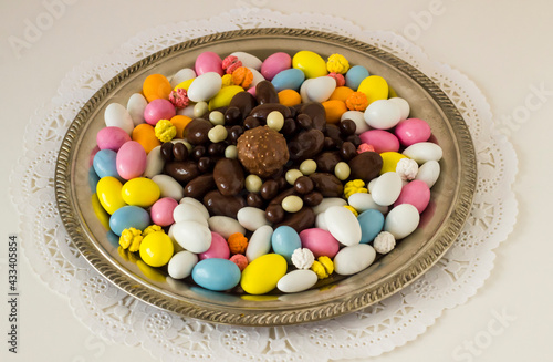 Traditional Turkish Colorful Almond Candies and Chocolates in vintage round tray.