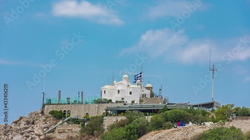 White church on Mount Lycabettus in Greece, clouds moving, timelapse photo