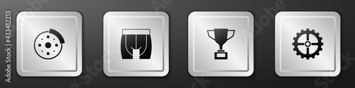 Set Bicycle brake disc, Cycling shorts, Award cup with bicycle and sprocket crank icon. Silver square button. Vector