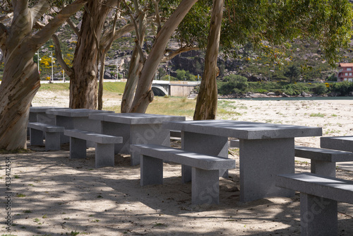 Tablou canvas Natural view of concrete tables and benches in Ezaro park, Galicia in Spain