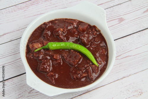 Filipino food called Pork Dinuguan or Pork Blood Stew photo