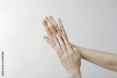 Close up of woman touching hand