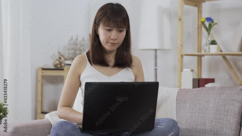 beautiful female reviewing the contents, ensuring the accuracy and quality of a written materials at home. beautiful female reviewing the contents, ensuring the accuracy and quality of a written materials at home.