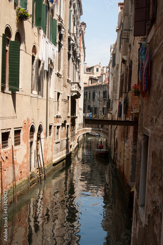 A small backstreet canal in Venice in Italy