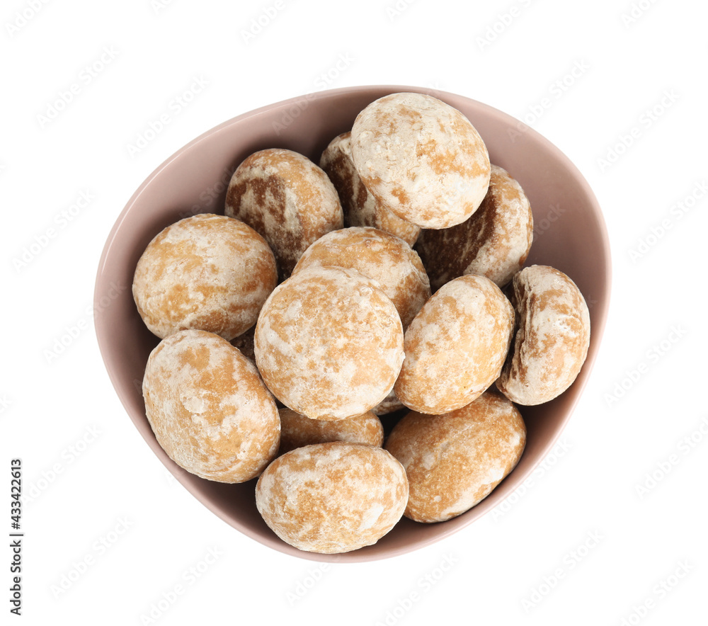 Tasty homemade gingerbread cookies in bowl on white background, top view Tasty homemade gingerbread cookies in bowl on white background, top view