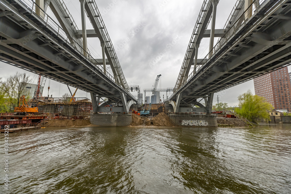 Transport bridge over the Moskva River in the russian capital on a cloudy day. Moscow, Russia Transport bridge over the Moskva River in the russian capital on a cloudy day. Moscow, Russia