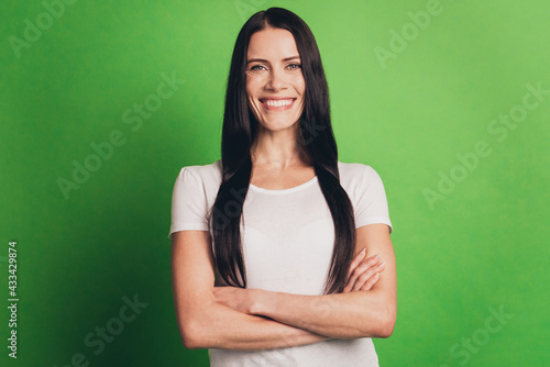 Portrait of confident woman having her hand crossed